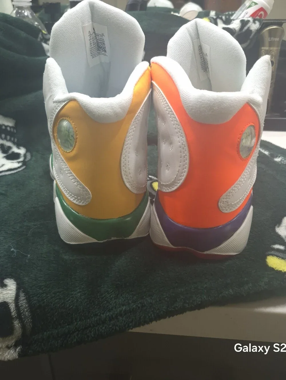 Jordan Men's White Sneakers with Orange, Yellow & Blue Accents